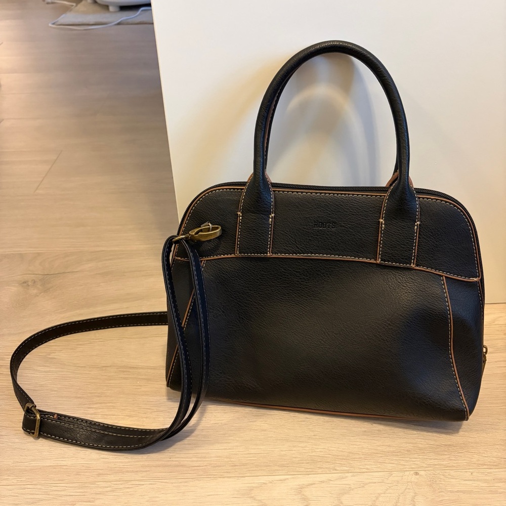 Roots Black Crossbody Bag with brown accents